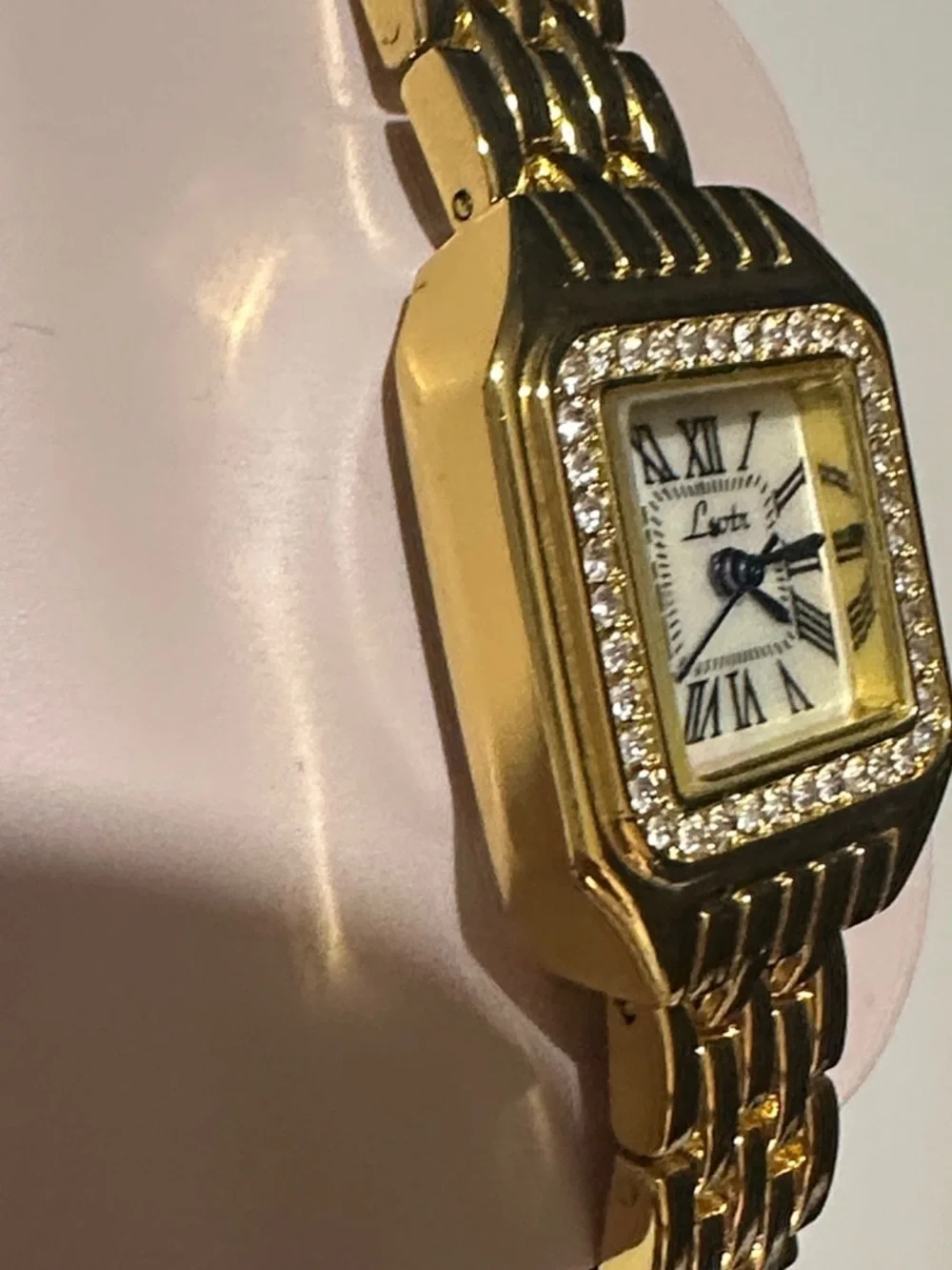 Elegant Gold-Tone Women's Crystal Bezel Watch with Blue Hands